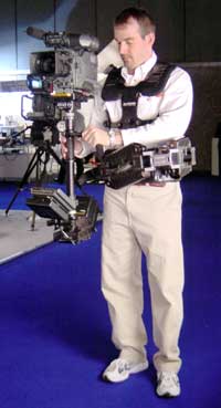 Thomas Howie, Glidecam's marketing manager, 
        demonstrating their new system